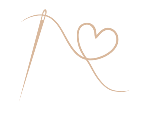 Ikon med tråd och hjärta som symboliserar omtanke och handgjord kvalitet.